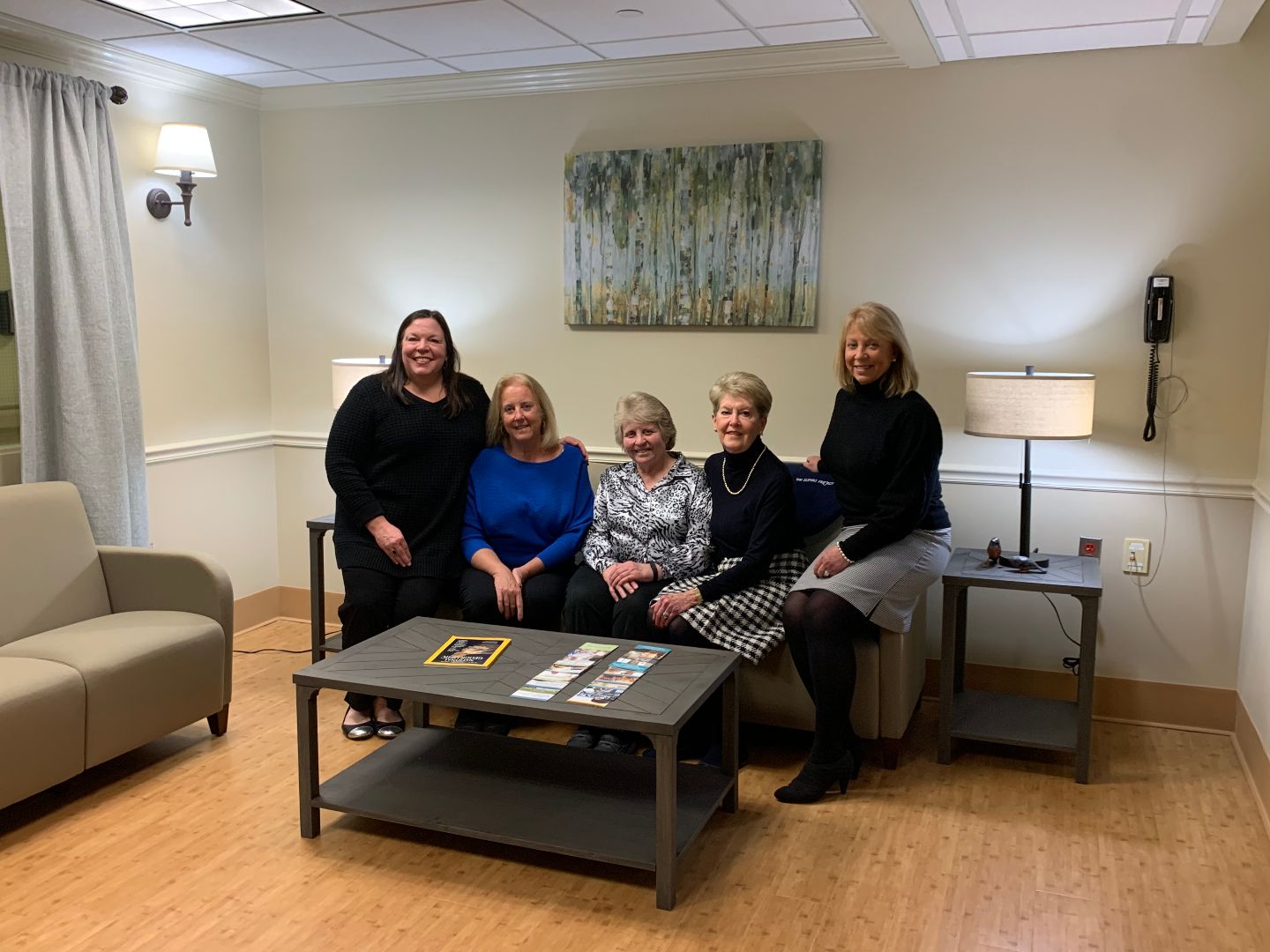 5 women in the newly-refurbished family lounge at Masonicare Health Center
