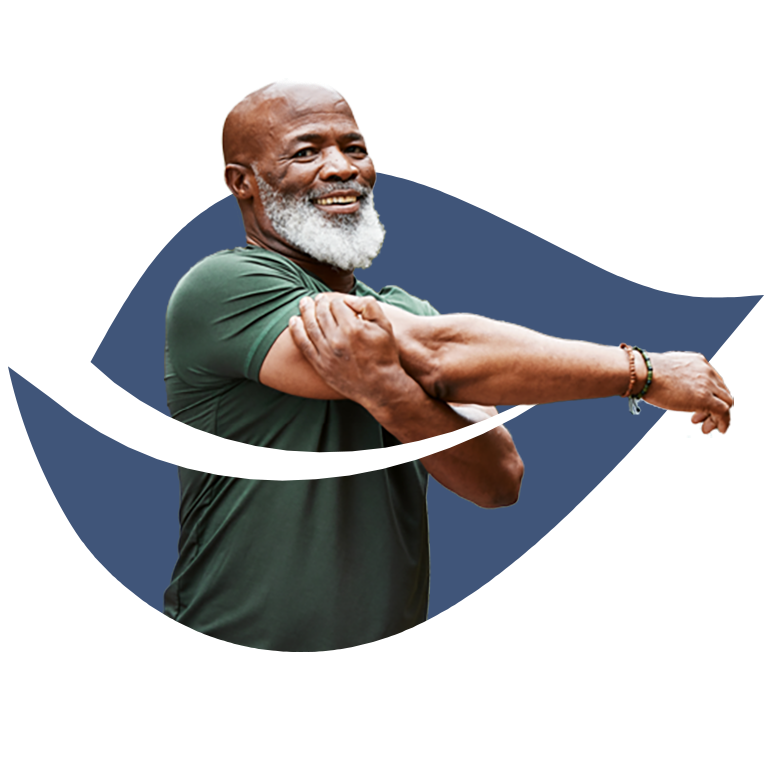 Senior man with white beard wearing a green shirt and stretching his arm over Masonicare blue leaf