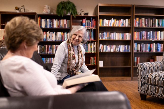 Couple friends talking and smiling
